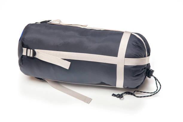 istock folded sleeping bag on a white background. items for tourism and camping 1825030921