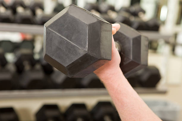 Conceptual image of a young man doing weight lifting excercises. Digital illustration.