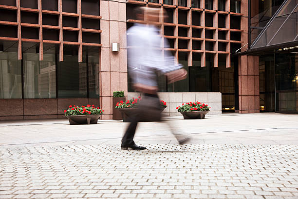 istock Businessman Walking to Office, Blurred Motion 182503245