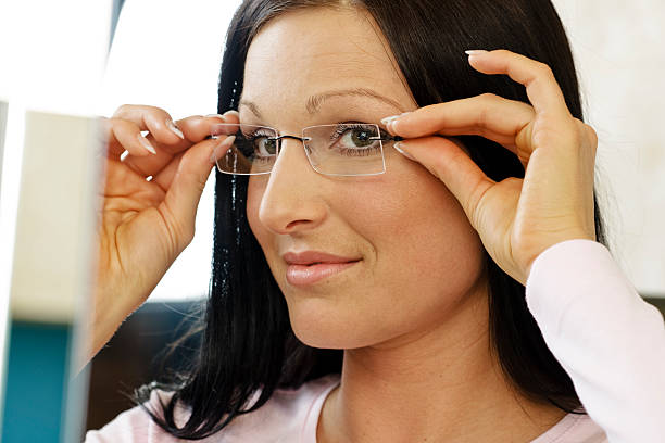 istock Woman Shopping for New Glasses 182503280