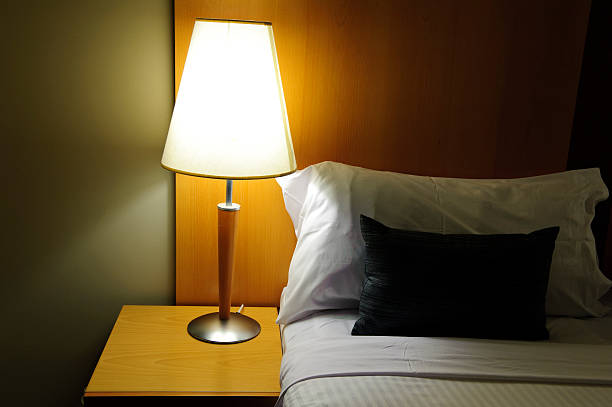 istock Bed clean made hotel linen lamp pillow 182503314