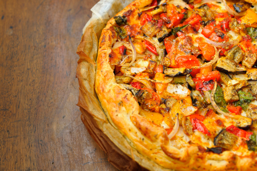 Homemade Cheese and Vegetable Pizza Pie in Greaseproof Paper