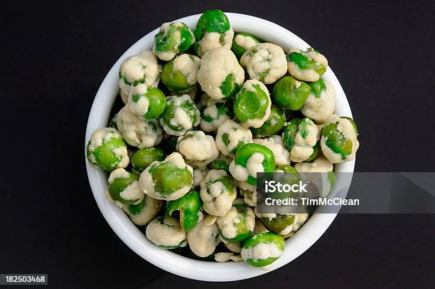 Wasabi Coated Peas In A White Bowl Stock Photo - Download Image Now - Bowl, Bunch, Close-up