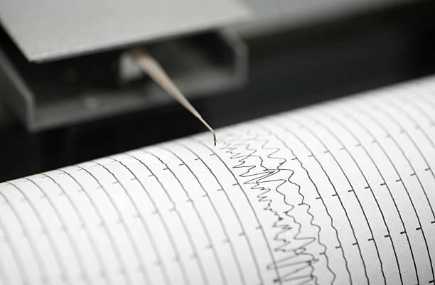 Seismometer printing details Cropped detail shot of seismometer printing line earthquake photos stock pictures, royalty-free photos & images