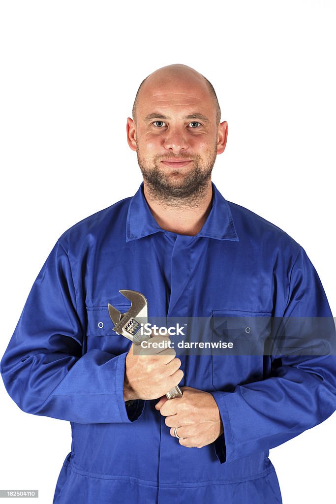 Engineer A male engineer with large tool. Blue Stock Photo