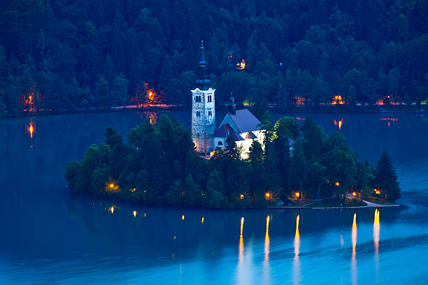 istock White Chapel on an Island in Lake Bled, Slovenia 182504171