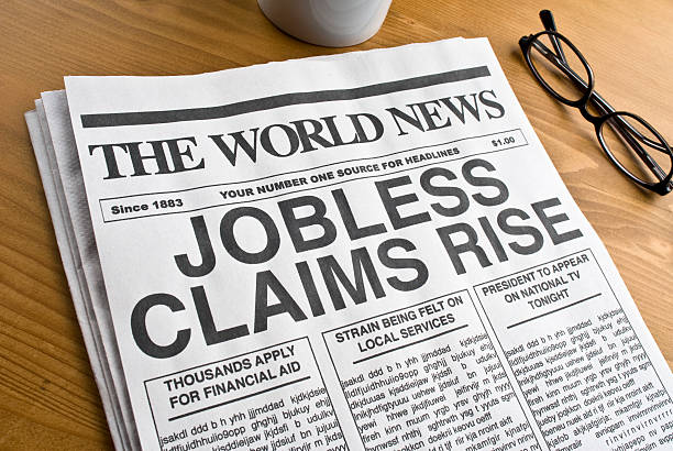 istock Unemployment newspaper Headline 182504702