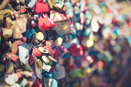 heart shape metal locks on bridge, copy  space, romantic Valentine's day greeting card
