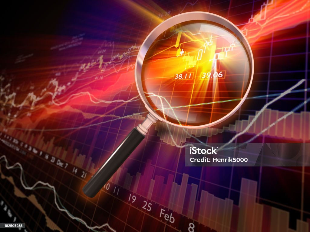 Des données financières avec une loupe - Photo de Marché boursier libre de droits