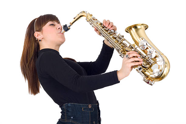 istock girl with saxophone 182505317