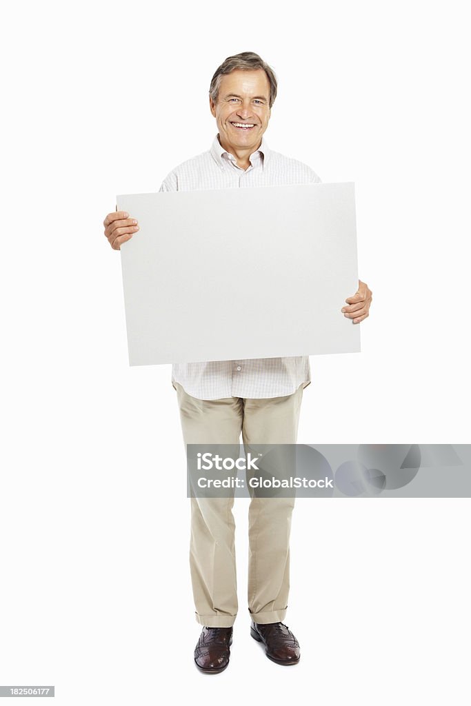 Hombre maduro feliz con un blanco signboard Aislado en blanco - Foto de stock de Hombres libre de derechos
