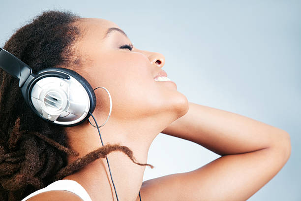 istock Young Woman With headphones 182506531