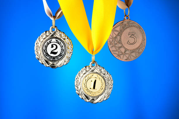 sports awards medals close-up, Award for high achievements, multi-colored backgrounds, first, second, third prizes sports awards medals close-up, Award for high achievements, multi-colored backgrounds, first, second, third prizes multi medal stock pictures, royalty-free photos & images