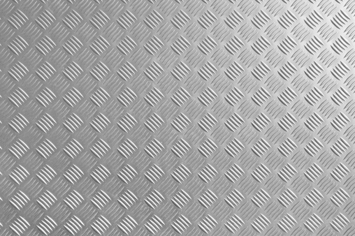 A diamond metal plate with pattern for backgrounds.