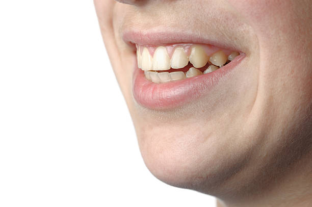 istock Smile close up isolated on white 182507223