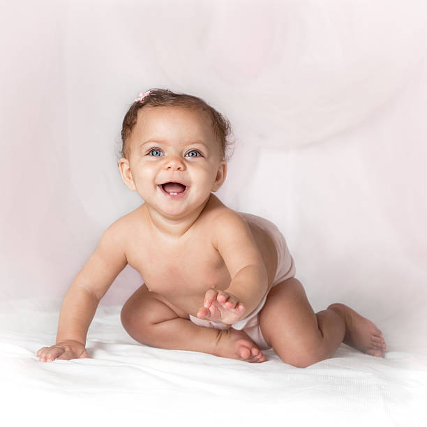 istock Beautiful Mixed Race Baby Crawling 182507383