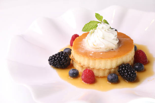 istock CLASSIC CREAM CARAMEL Pudding Cake served in dish isolated background side view of arabic dessert bake food 1825076011