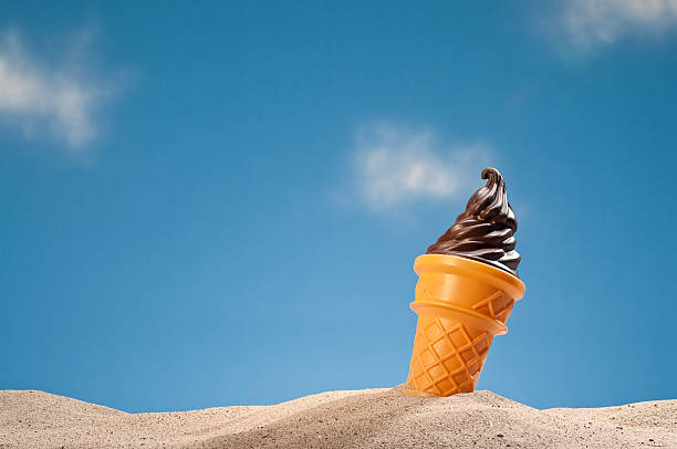 istock Ice Cream Cone IN The Sand 182509045