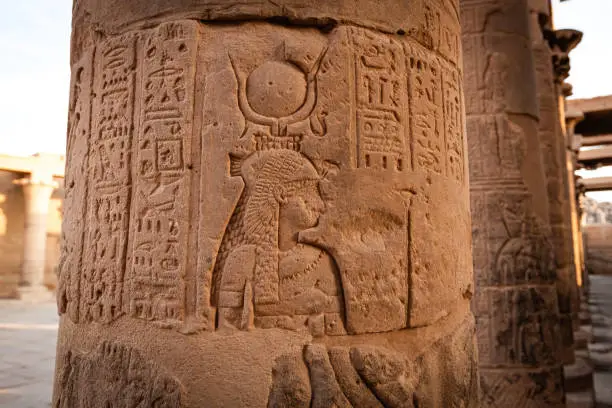 Details of Philae temple in Aswan Upper Egypt. Stone carved pillars with Egyptian god images