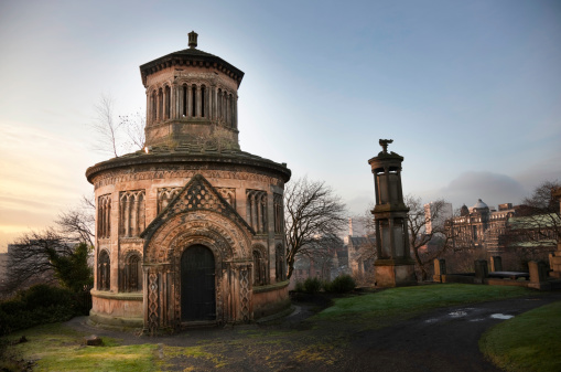 The Monteath mausoleum in Glasgow's Necropolis cemetery at sunset. Built in 1842 in the style of a Knights Templar round church.