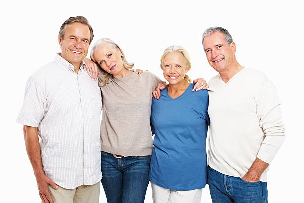 istock Portrait of two happy senior couples on white 182509641