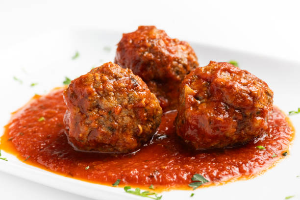 Italian meatballs on white background stock photo