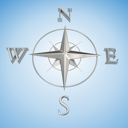 3d render.  Silver compass rose isolated on blue background.