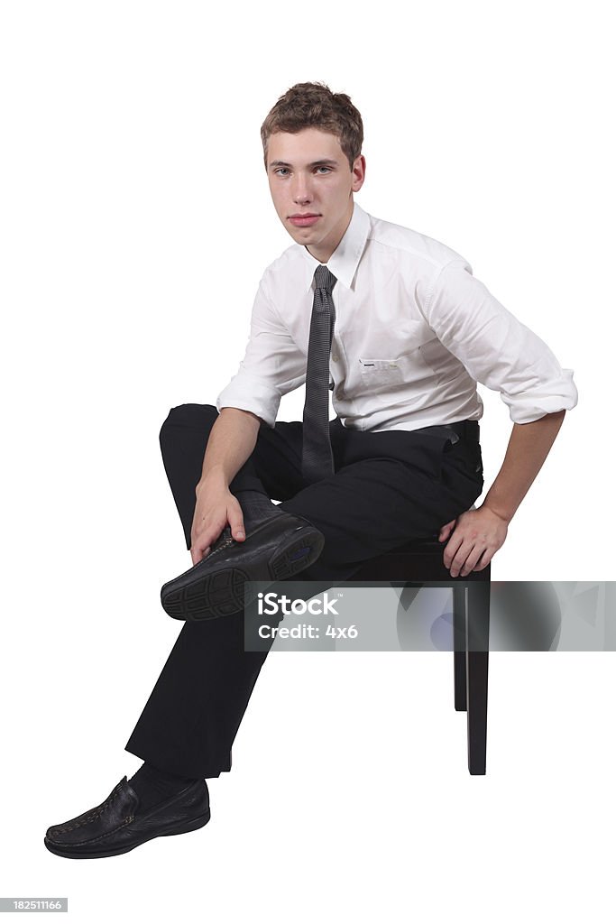 Empresário sentando perna cruzada - Foto de stock de 20 Anos royalty-free