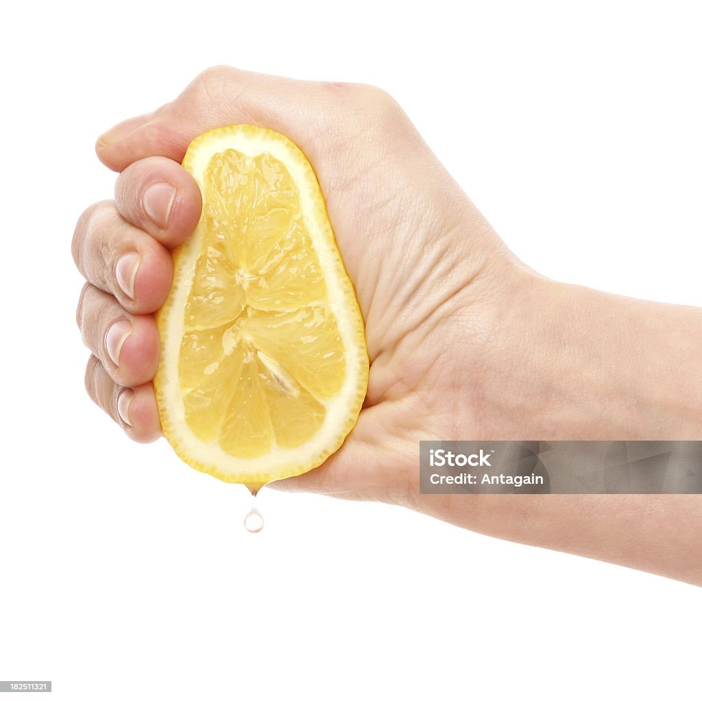 Hand mit Zitrone - Lizenzfrei Quetschen Stock-Foto