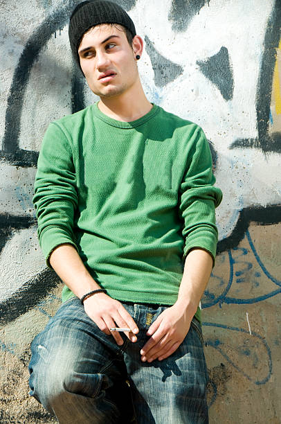 istock Hansome Hip Hop Man Smoking 182511371
