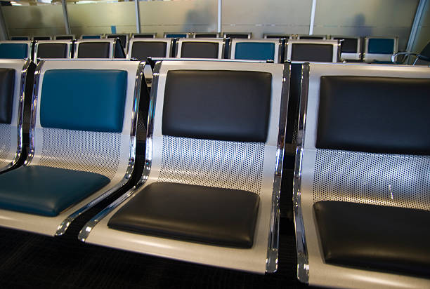istock seats at airport waiting room 182511388