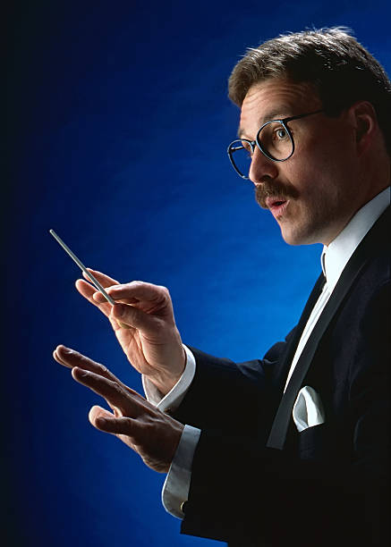 Male conductor working stock photo