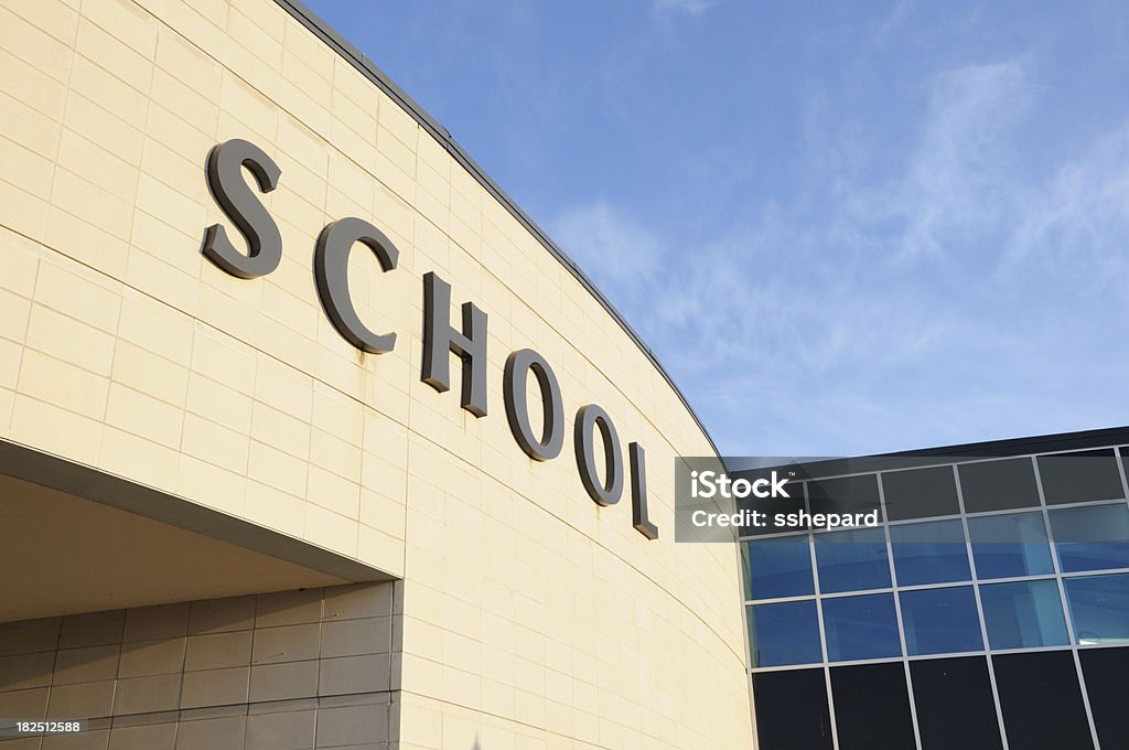 Modern school sign with copy space Modern school sign on curved surface with copy space Sign Stock Photo