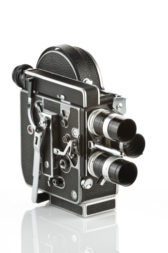 Vintage 8mm Movie Camera on White Background. Related photos on My Portfolio.