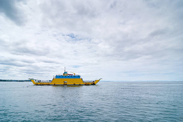 istock ferry boat crossing a channel 182513480