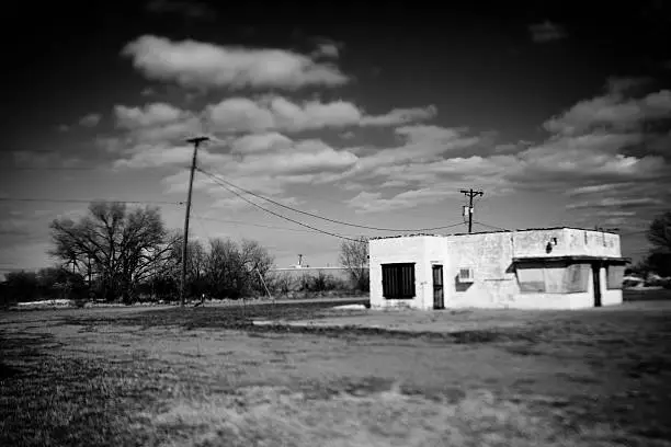 Abandoned Route 66 building in Tucumcari, New Mexico.  Photographed with a tilt shift lens.