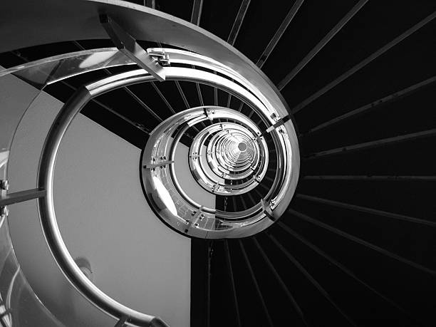 istock Abstract - Spiral Staircase from below, in Black and White 182514055