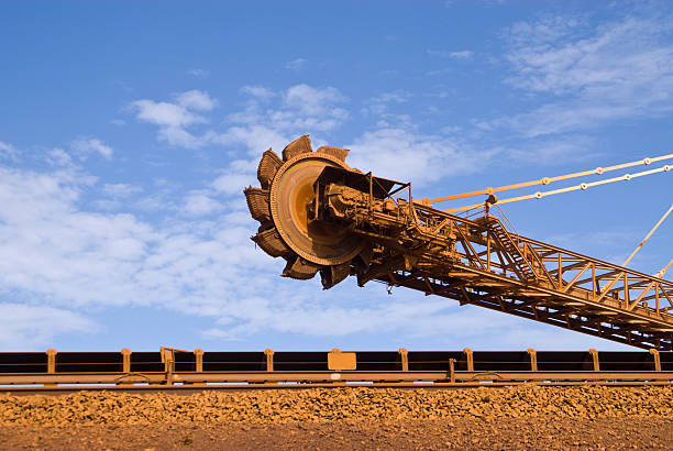 Reclaimer on Iron Ore Mine Site Iron Ore Mine Site Port Hedland Western Australiasee other mining related photos Reclaimer stock pictures, royalty-free photos & images