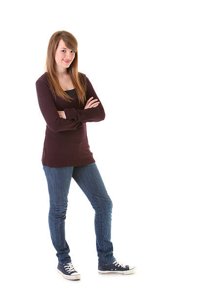 istock teen girl standing on white 182514778