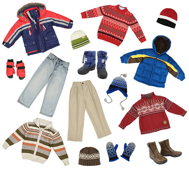 Children clothes Color- and size-coordinated collection of boys winter clothes isolated on white kids winter coat stock pictures, royalty-free photos & images