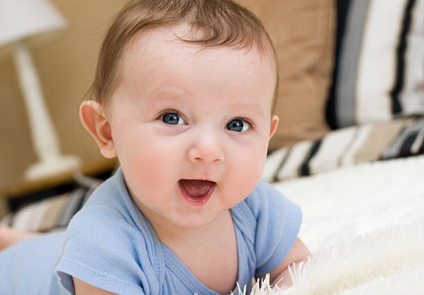 istock happy baby big smile 182515203