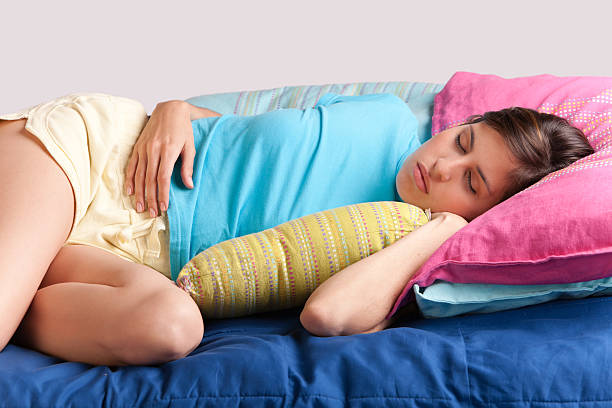 istock Cute young woman taking a nap 182515430