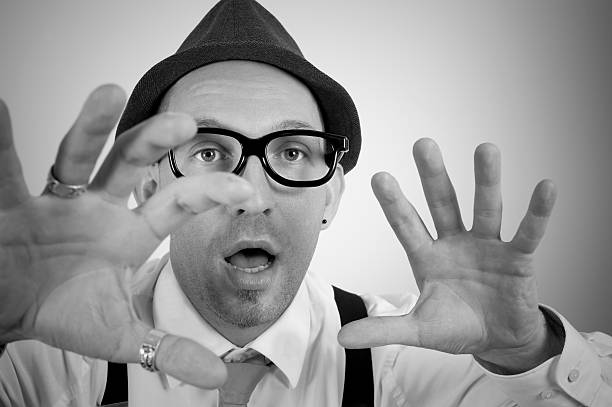 istock vintage man wearing glasses,  black and white image with grain 182515612