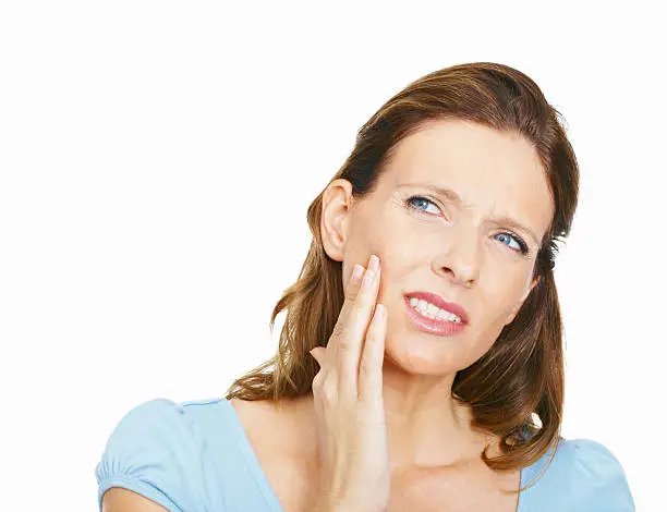 Photo of Mature woman suffering from toothache on white background