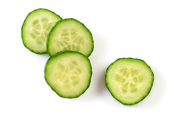 fatias de pepino - cucumber vegetable close up fruit - fotografias e filmes do acervo