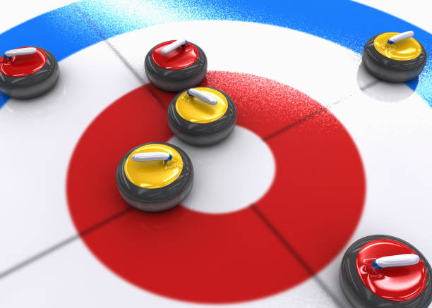 Curling rocks on ice stock photo