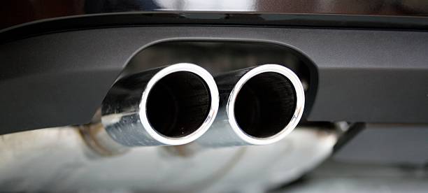 istock Car exhaust pipes on car close up 182516219