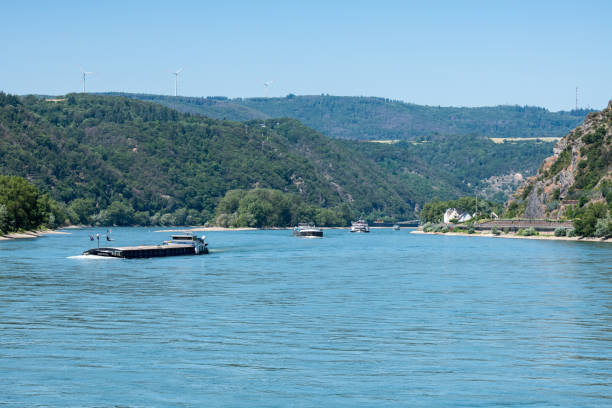 istock Cargo vessels navigating upstream on the Rhine 1825163396