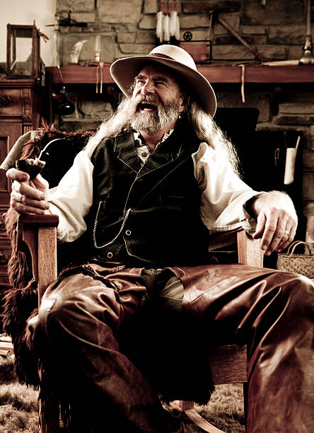 istock Old-Fashioned Western Cowboy Laughing 182516361