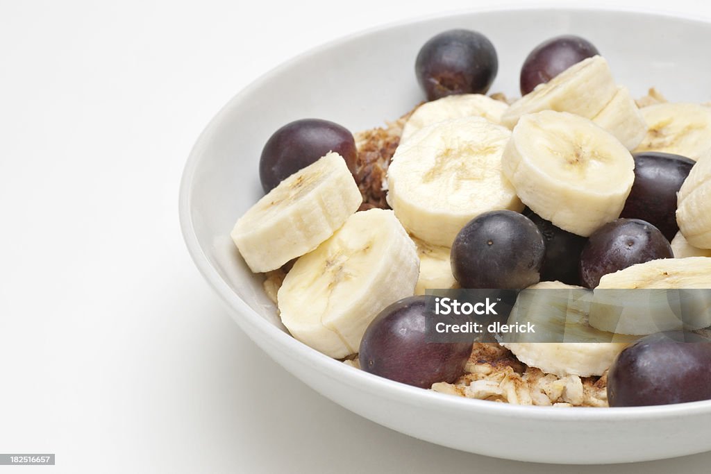 Schüssel Haferflocken-Frühstück mit Zerealien und Obst - Lizenzfrei Antioxidationsmittel Stock-Foto